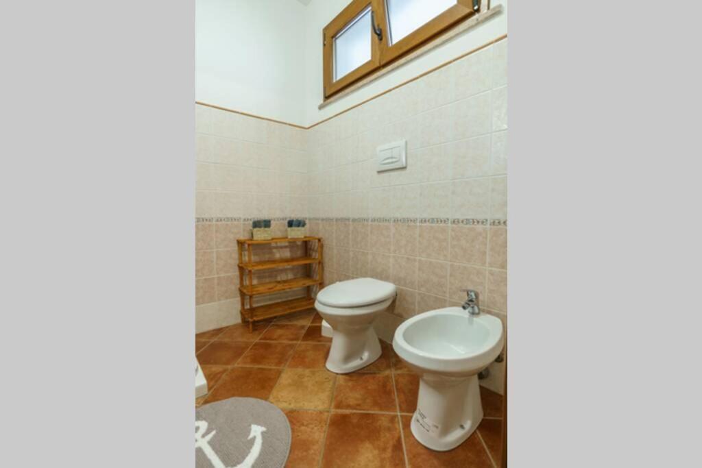 Very Well Apartment Porto Torres Buitenkant foto